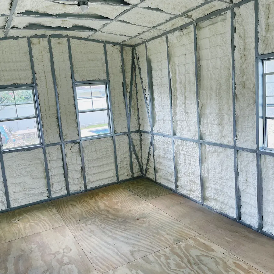 Closed-cell spray foam insulation applied to wall cavities in a residential project in Fostoria
